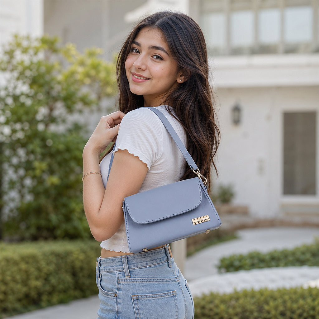 Nomad Stylish Light Blue Shoulder Bag – Flap-Over Baguette with Wide Fabric Strap