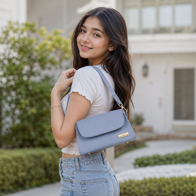 Nomad Stylish Light Blue Shoulder Bag – Flap-Over Baguette with Wide Fabric Strap Main Image